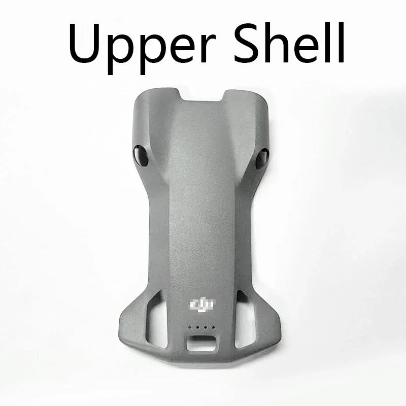 Gray upper shell drone cover with ventilation slots and DJI logo on white background