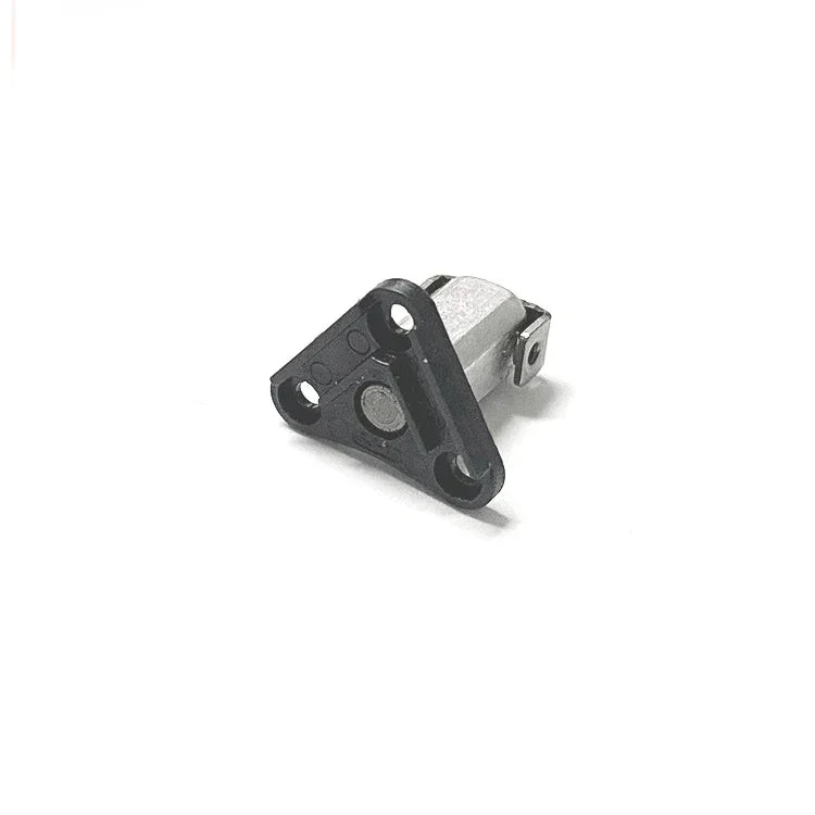 Small metal and black plastic mounting sensor component with three screw holes on white background