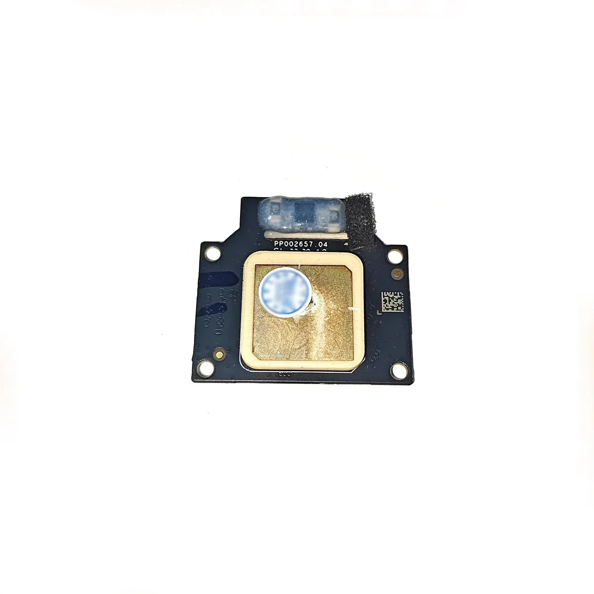 Close-up of a small electronic sensor module with a gold square sensor and a blue protective cover on a white background