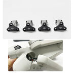 Set of four triangular metal drone motor arms and close-up of white drone arm joint repair
