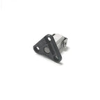 Small metal and black plastic automotive sensor with triangular mounting plate on white background