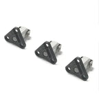 Three automotive ignition control module sensors with black triangular mounts on a white background