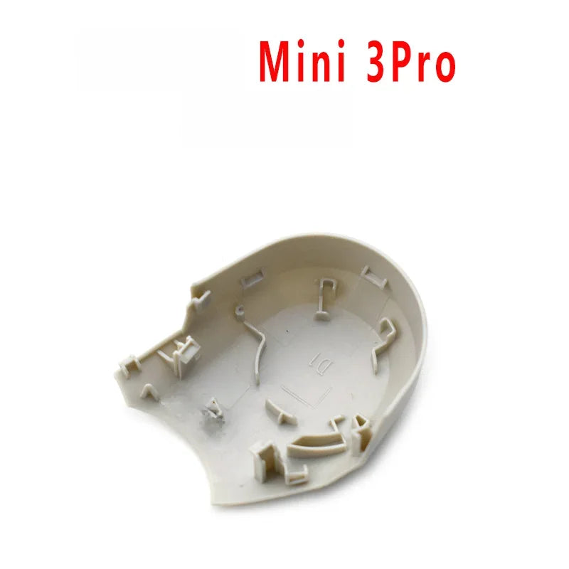 Mini 3Pro drone beige inner shell casing part with mounting clips on white background