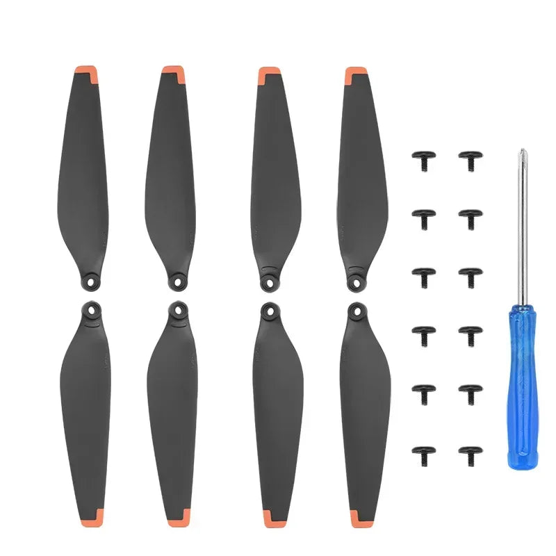 Set of eight black drone propeller blades with orange tips, screws, and blue screwdriver on white background